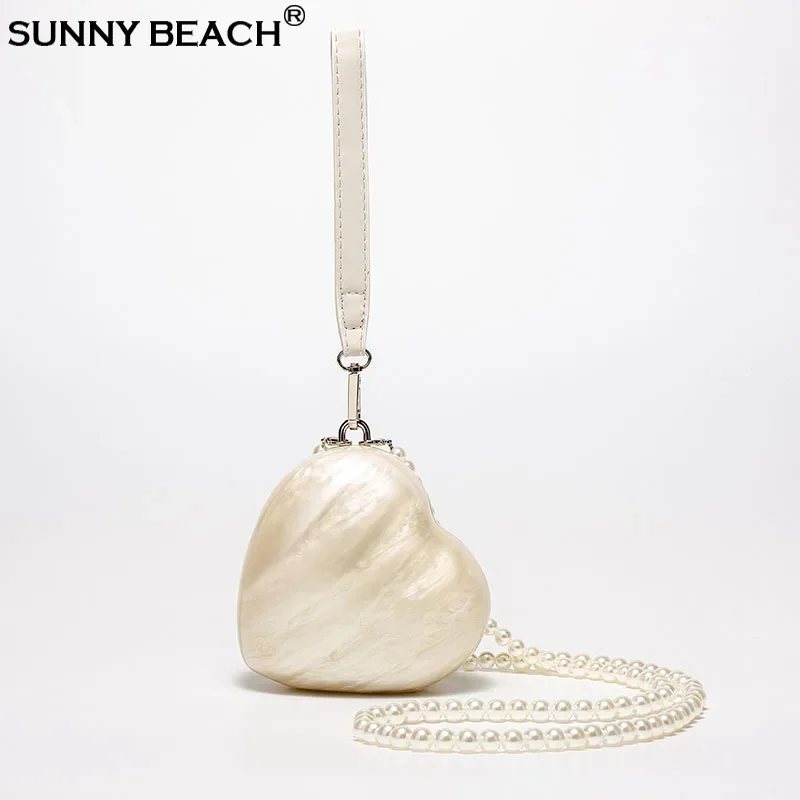 Fashion Acrylic Small Heart Egg Pearl White Hand Bag Luxury Tote Crossbody Bag Purse Clutch Bag Women Shoulder Party Designer
Fashion Acrylic Small Heart Egg Pearl White Hand Bag Luxury Tote Crossbody Bag Purse Clutch Bag Women Shoulder Party Designer