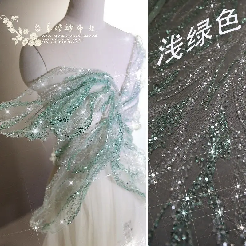 Small Fresh Elegant Green Nail Bead Embroidery Sequin Lace Fabric DIY Wedding Dress Accessories Niche Design Fabric By The Meter
Small Fresh Elegant Green Nail Bead Embroidery Sequin Lace Fabric DIY Wedding Dress Accessories Niche Design Fabric By The Meter