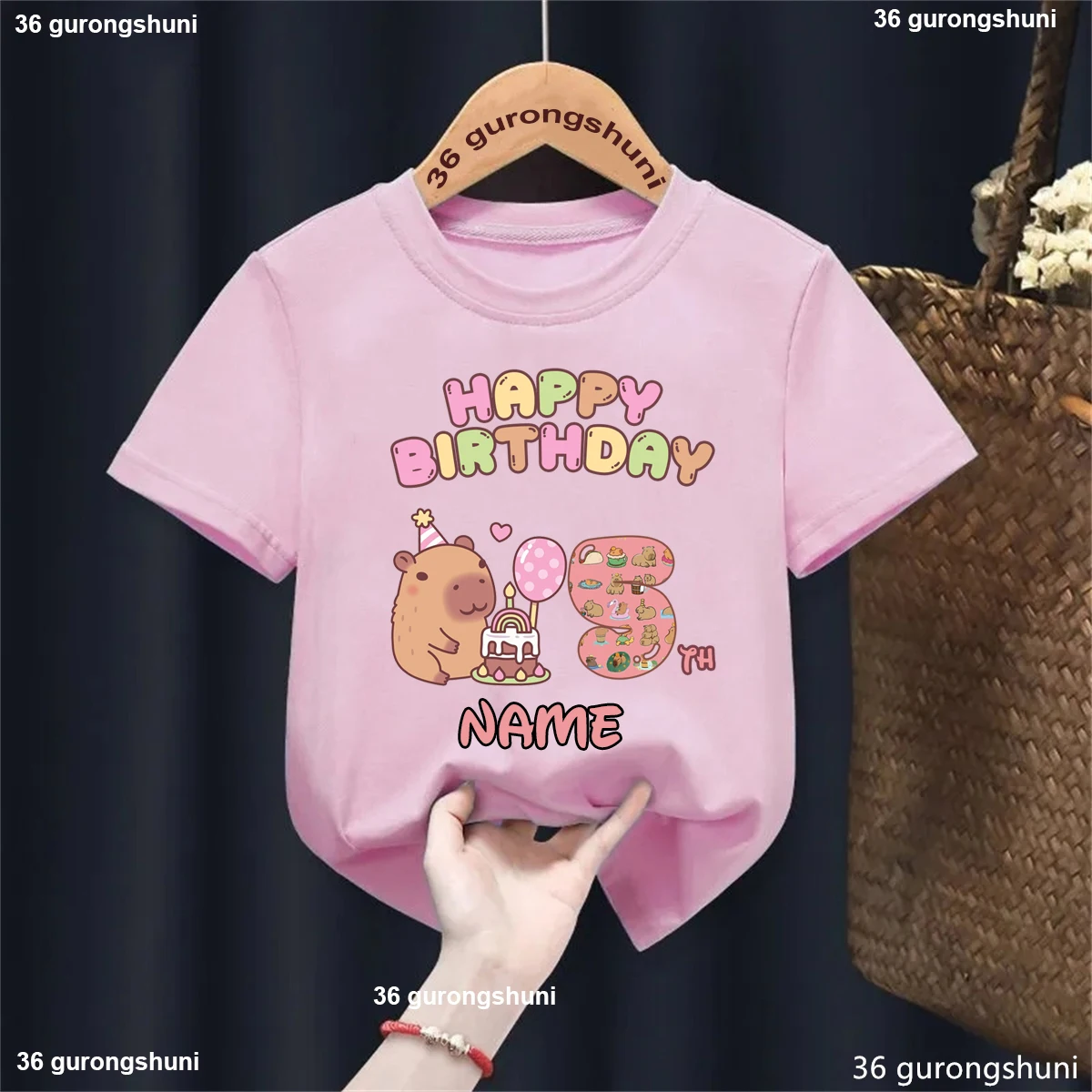 Colorful Happy Birthday 4th/5th Capybare Printed T Shirt Girls/Boys Kawaii Kids Clothes Custom Name Birthday Party T-Shirt
Colorful Happy Birthday 4th/5th Capybare Printed T Shirt Girls/Boys Kawaii Kids Clothes Custom Name Birthday Party T-Shirt