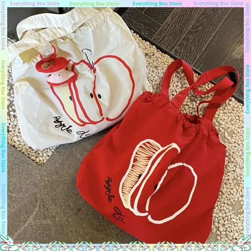 Summer New Drawstring Nylon Shoulder Bag Ins Lightweight Red And White Contrast Apple Commuter Handbag Outdoor Shopping Bag
Summer New Drawstring Nylon Shoulder Bag Ins Lightweight Red And White Contrast Apple Commuter Handbag Outdoor Shopping Bag