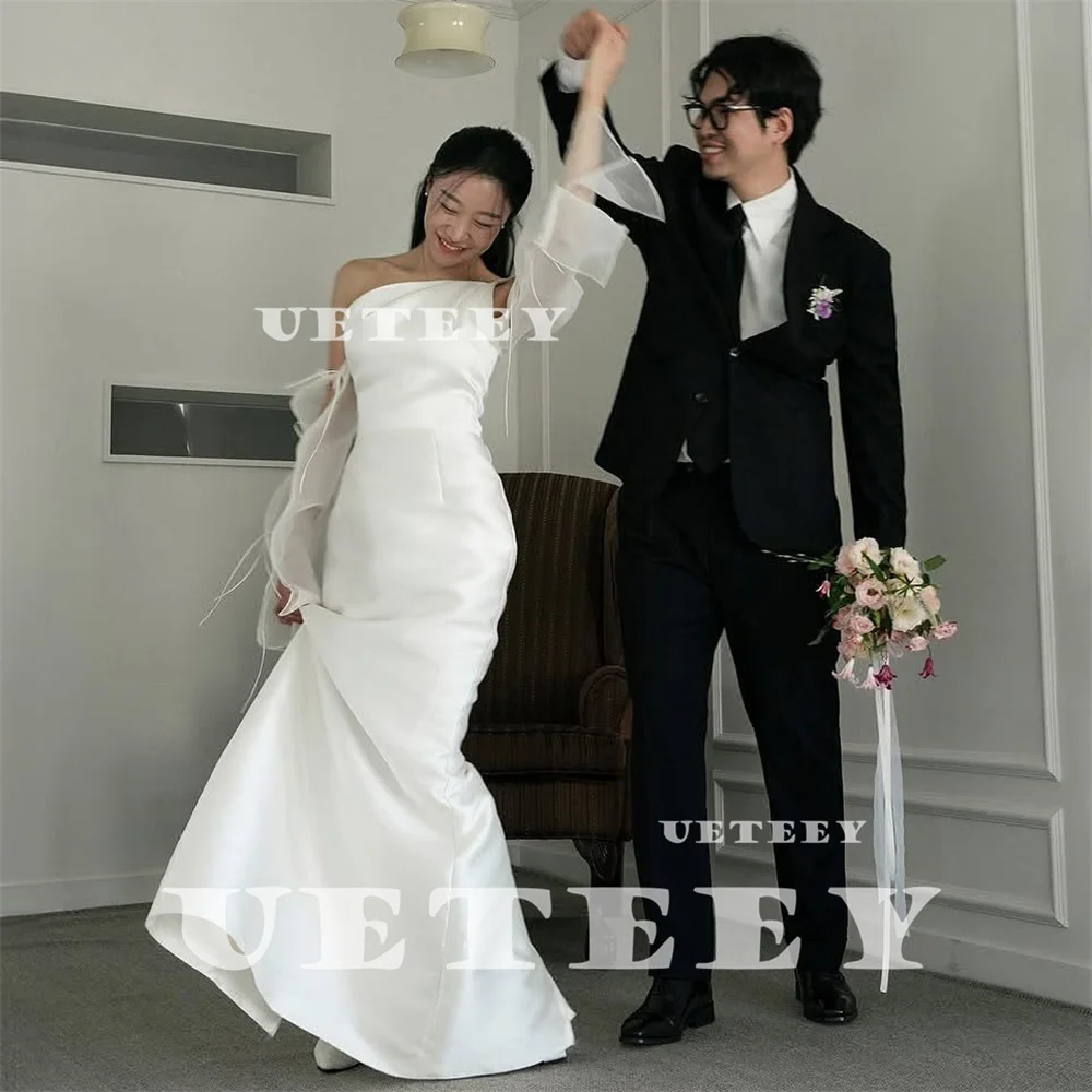 UETEEY Customized Korea Simple One Shoulder Fairy Satin Mermaid Wedding Dress For Women Zipper Back Court Train Bridal Gown
UETEEY Customized Korea Simple One Shoulder Fairy Satin Mermaid Wedding Dress For Women Zipper Back Court Train Bridal Gown