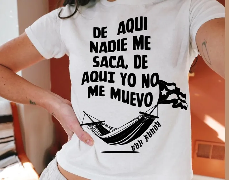 Bad Bunny Puerto Rican Pride Themed T-Shirt: Black Base with Spanish Quote & Caribbean Hammock Design Fan Merch
Bad Bunny Puerto Rican Pride Themed T-Shirt: Black Base with Spanish Quote & Caribbean Hammock Design Fan Merch