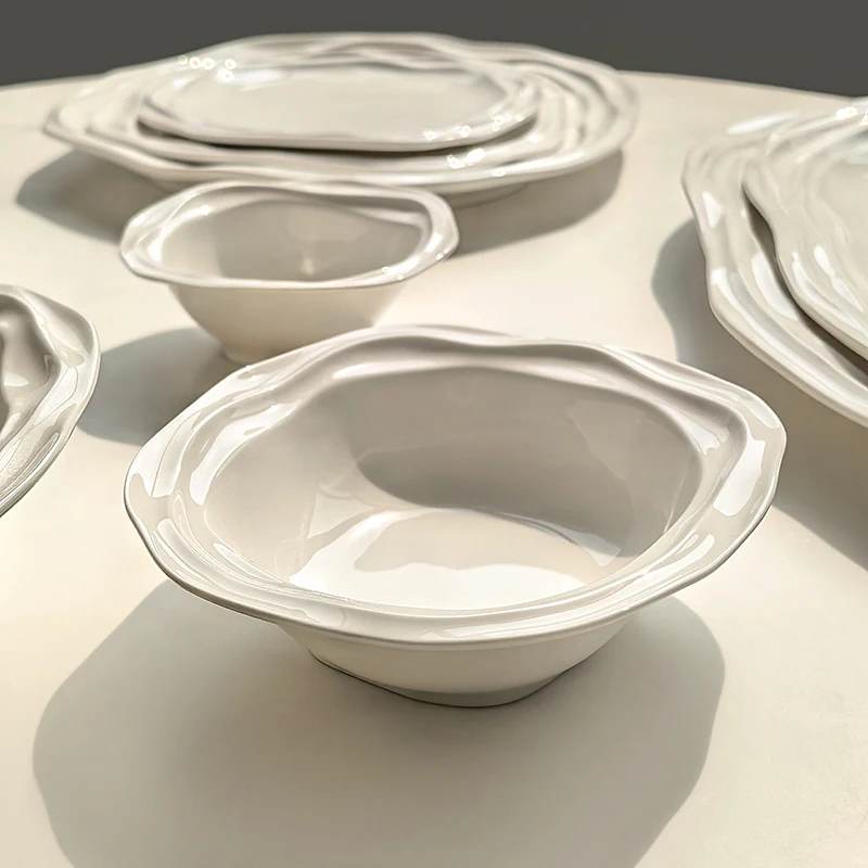 French wavy ceramic tableware bowls and plates, household breakfast plates, exquisite high-value dim sum plates
French wavy ceramic tableware bowls and plates, household breakfast plates, exquisite high-value dim sum plates