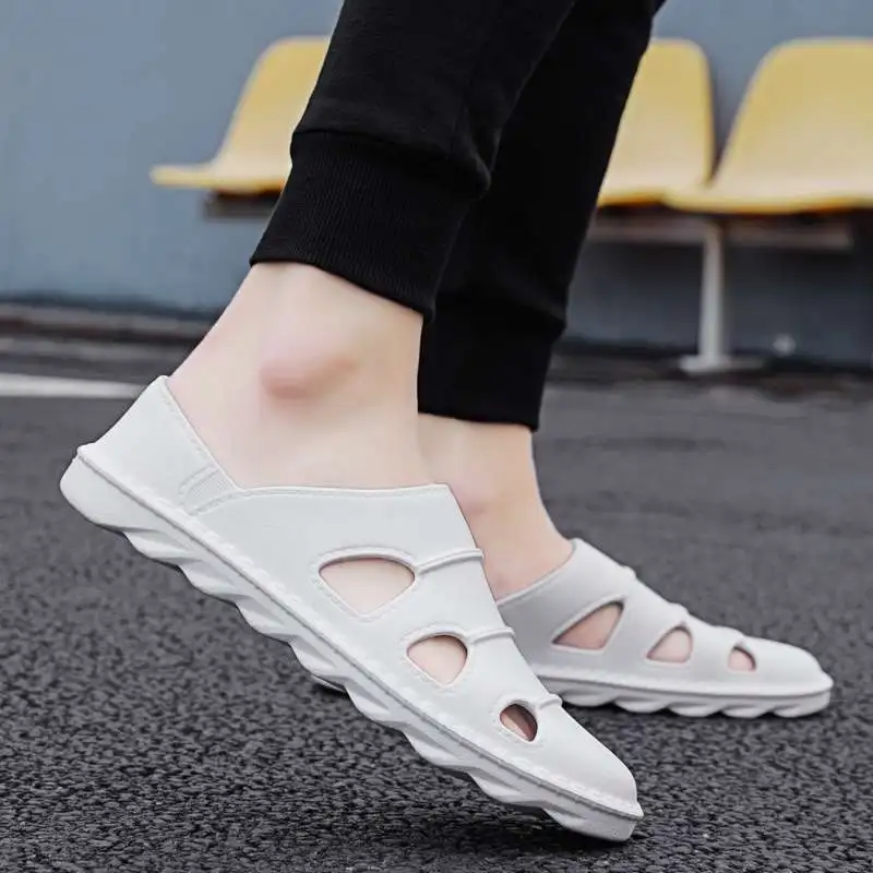 Мужские тапочки, летние дышащие нескользящие пляжные сандалии большого размера, римская обувь Baotou с мягкой подошвой
Мужские тапочки, летние дышащие нескользящие пляжные сандалии большого размера, римская обувь Baotou с мягкой подошвой