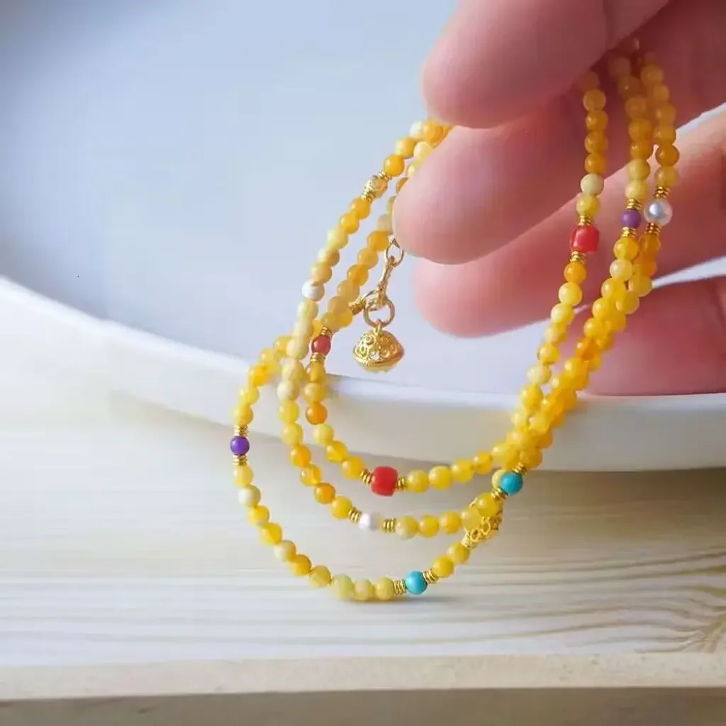 UMQ Natural honey 4mm gold-plated demon flower beeswax retro design colorful three-ring bracelet
UMQ Natural honey 4mm gold-plated demon flower beeswax retro design colorful three-ring bracelet