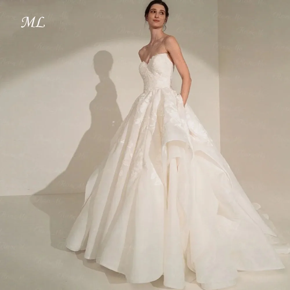 Новое свадебное платье ML 2026 А-силуэта без рукавов с цветочным кружевом, элегантное, с длинным шлейфом, на заказ, класса люкс
Новое свадебное платье ML 2026 А-силуэта без рукавов с цветочным кружевом, элегантное, с длинным шлейфом, на заказ, класса люкс