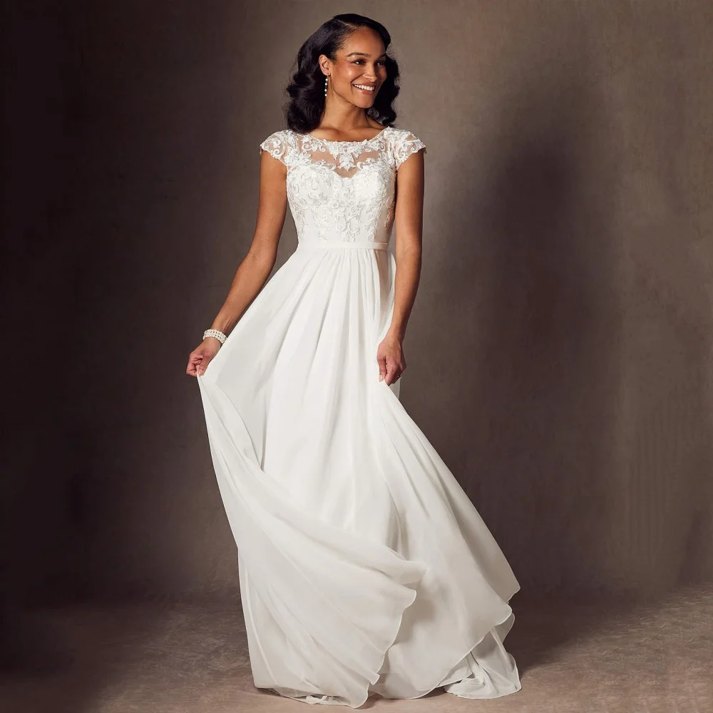 Customized Elegant Wedding Dresses A Line O Neck Bride Dress Lace Cap Sleeves Bridal Gowns Applique Vestidos De Novia
Customized Elegant Wedding Dresses A Line O Neck Bride Dress Lace Cap Sleeves Bridal Gowns Applique Vestidos De Novia