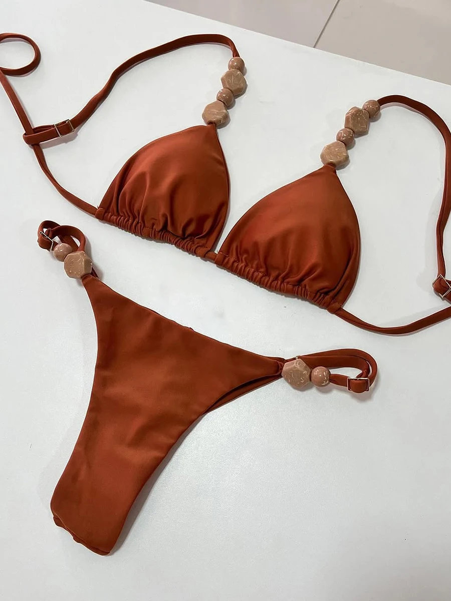 Thong Bikinis 2026 Trikini Solid Padded Stone Swimsuit Women Sexy Brazilian Swimwear Female Bathers Bathing Swimming Swim Suit
Thong Bikinis 2026 Trikini Solid Padded Stone Swimsuit Women Sexy Brazilian Swimwear Female Bathers Bathing Swimming Swim Suit