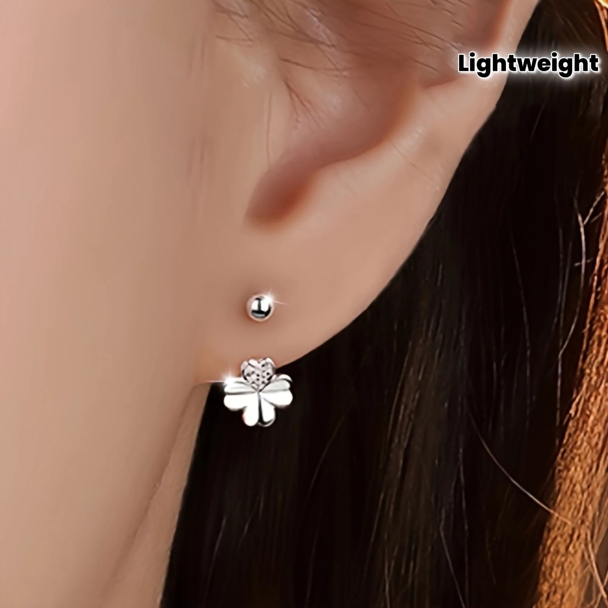 A pair of elegant four-leaf clover earrings with 925 silver-plated stud earrings with synthetic zirconia, screw-back design, hypoallergenic, light, suitable for daily wear, Thanksgiving gift.
A pair of elegant four-leaf clover earrings with 925 silver-plated stud earrings with synthetic zirconia, screw-back design, hypoallergenic, light, suitable for daily wear, Thanksgiving gift.