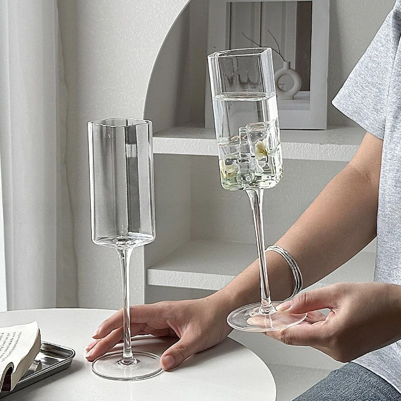 Transparent High Footed Glass Flat Square Glass Cocktail Glass Champagne Glasss Household Sparkling Water Cold Drink Juice Cup
Transparent High Footed Glass Flat Square Glass Cocktail Glass Champagne Glasss Household Sparkling Water Cold Drink Juice Cup