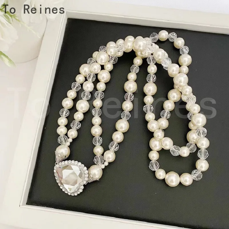 To Reines Fashion Heart Shaped Pearl Necklace Women Light Luxury Temperament Pendant Choker Wedding Party Vintage Jewelry Gift
To Reines Fashion Heart Shaped Pearl Necklace Women Light Luxury Temperament Pendant Choker Wedding Party Vintage Jewelry Gift