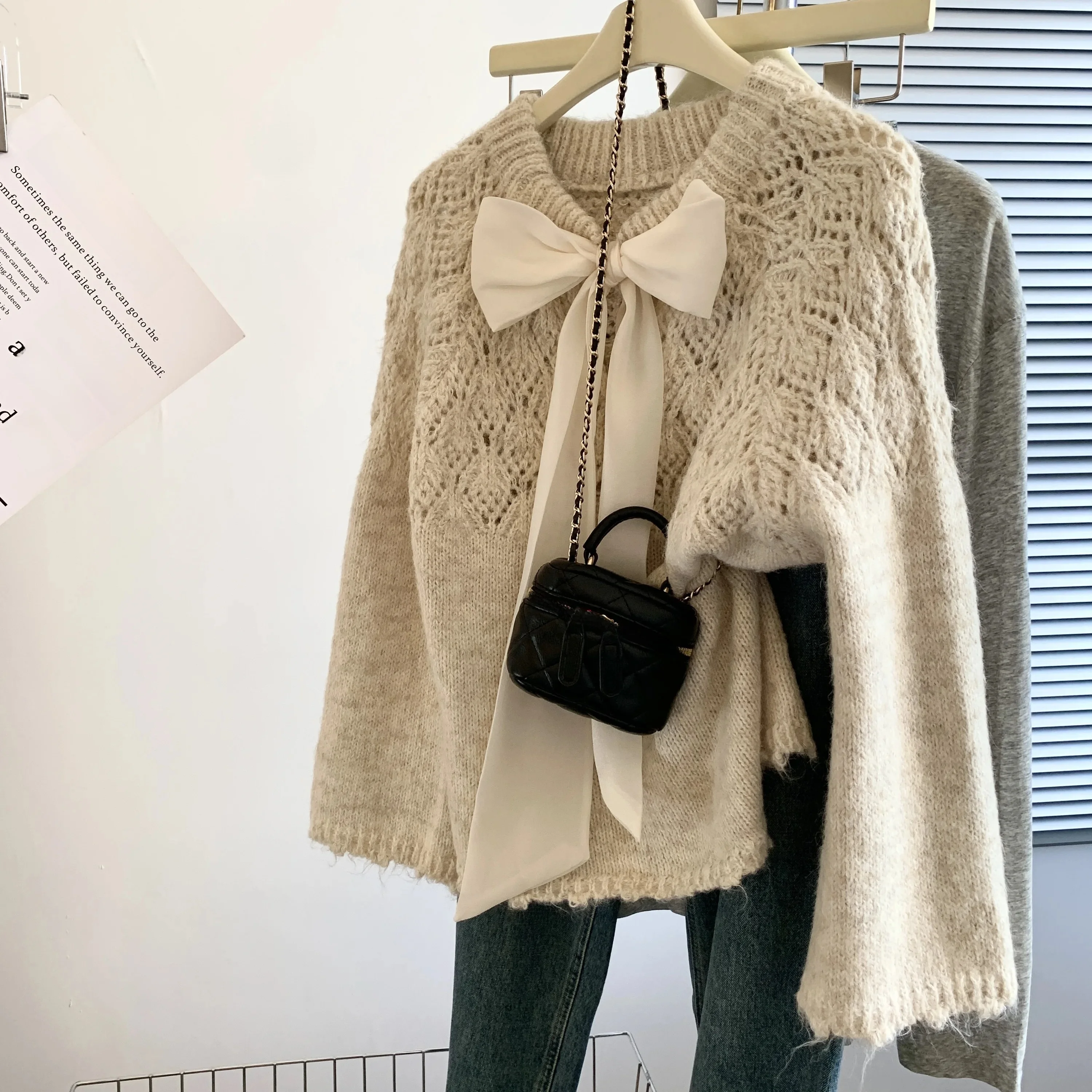Loose Knitted Knot Sweater Women's Autumn Winter Design Sense Hollow out Female Fashion Commute Style Korean Version
Loose Knitted Knot Sweater Women's Autumn Winter Design Sense Hollow out Female Fashion Commute Style Korean Version
