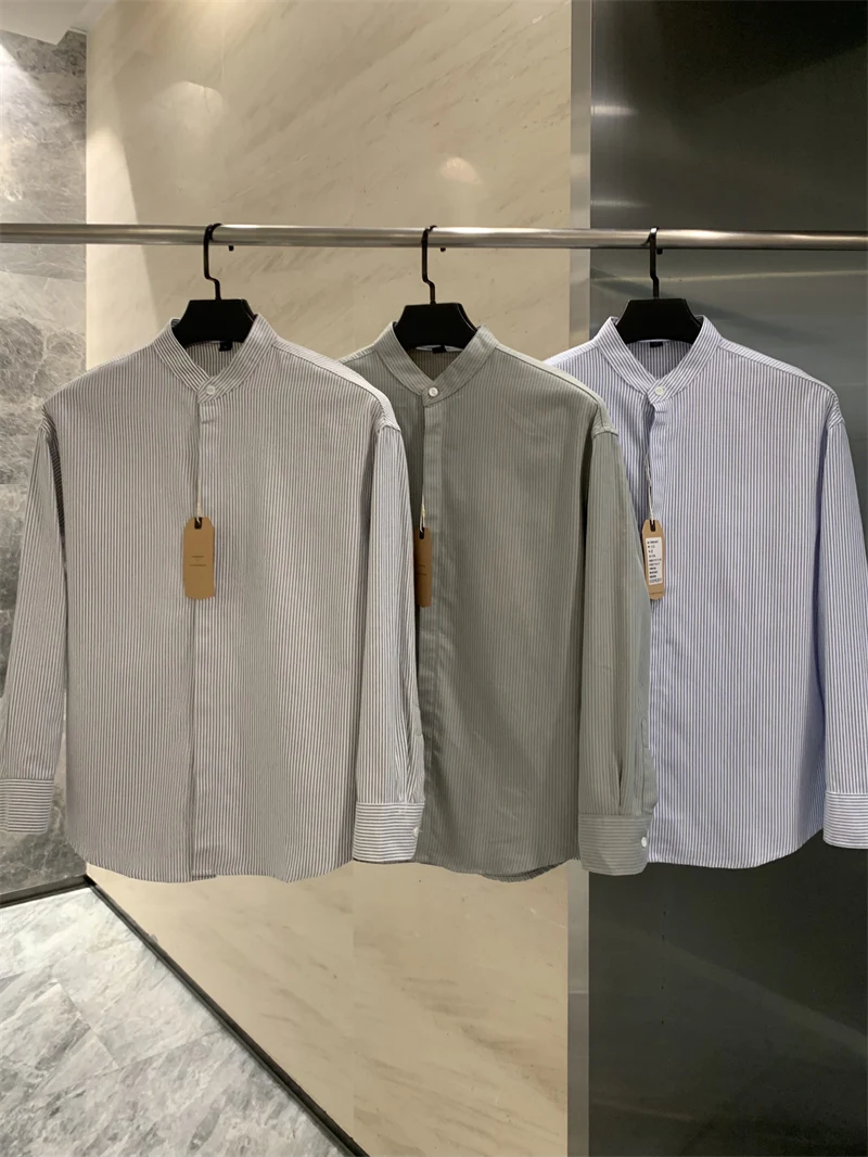 Мужская ретро-рубашка из хлопка с длинным рукавом, воротником-стойкой и полосками, универсальная верхняя одежда для осеннего сезона, повседневная, приталенного кроя
Мужская ретро-рубашка из хлопка с длинным рукавом, воротником-стойкой и полосками, универсальная верхняя одежда для осеннего сезона, повседневная, приталенного кроя