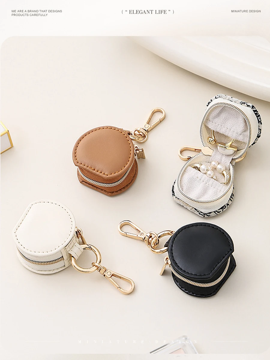 Portable Mini Jewelry Box for Travel: Hanging Earring, Stud, Ring, and Small Accessories Storage Case
Portable Mini Jewelry Box for Travel: Hanging Earring, Stud, Ring, and Small Accessories Storage Case