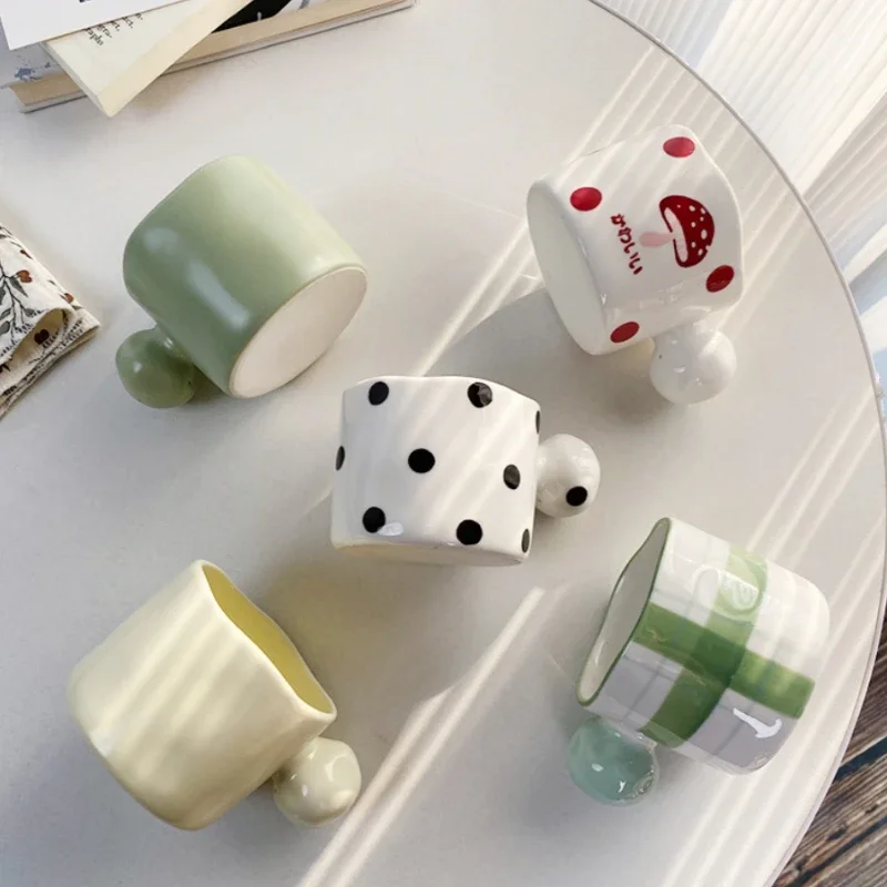 Korean Style Cute Ins Black and White Polka Dot Irregular Mug Simple Ball Handle Design Ceramic Coffee Breakfast Milk Cup 
Korean Style Cute Ins Black and White Polka Dot Irregular Mug Simple Ball Handle Design Ceramic Coffee Breakfast Milk Cup