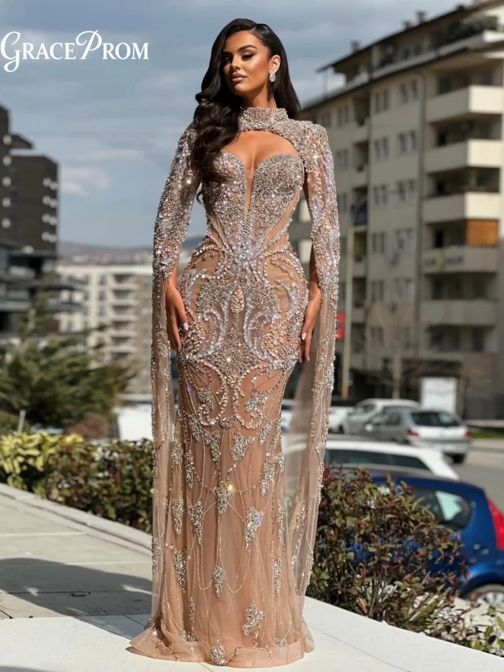 Radiant Nude Sheer Mesh Long Cape Sleeve Party Dress Ornate Beaded High Neck Cutout Evening Gown For Wedding Guests فساتين سهرة
Radiant Nude Sheer Mesh Long Cape Sleeve Party Dress Ornate Beaded High Neck Cutout Evening Gown For Wedding Guests فساتين سهرة