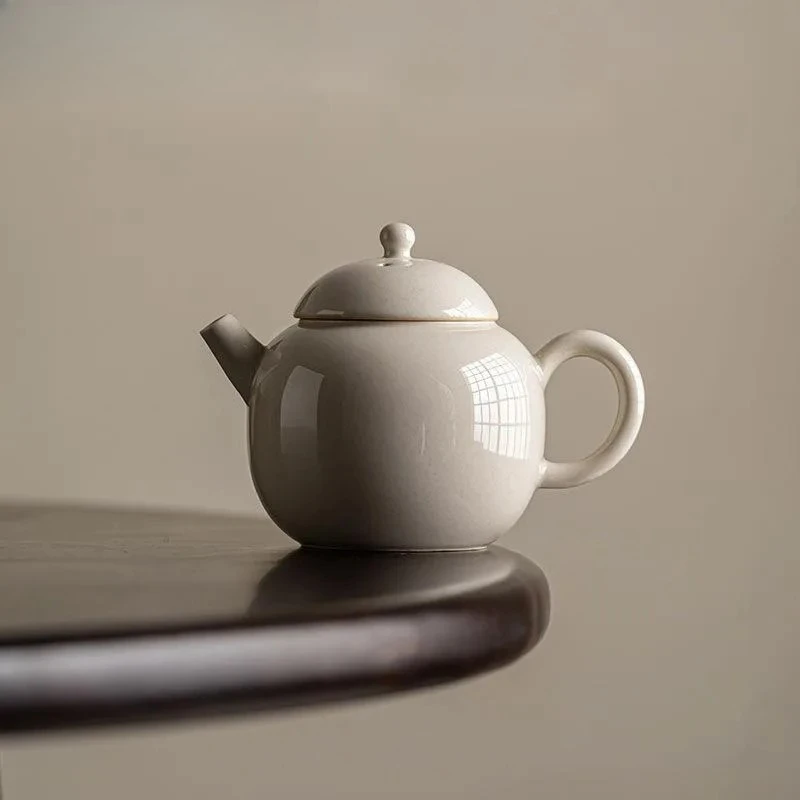 110ml Handmade Grass Wood Ash Porcelain Teapot Ancient Pot Tea Brewing Kettle with Infuser White Tea Tableware Supplies Craft
110ml Handmade Grass Wood Ash Porcelain Teapot Ancient Pot Tea Brewing Kettle with Infuser White Tea Tableware Supplies Craft