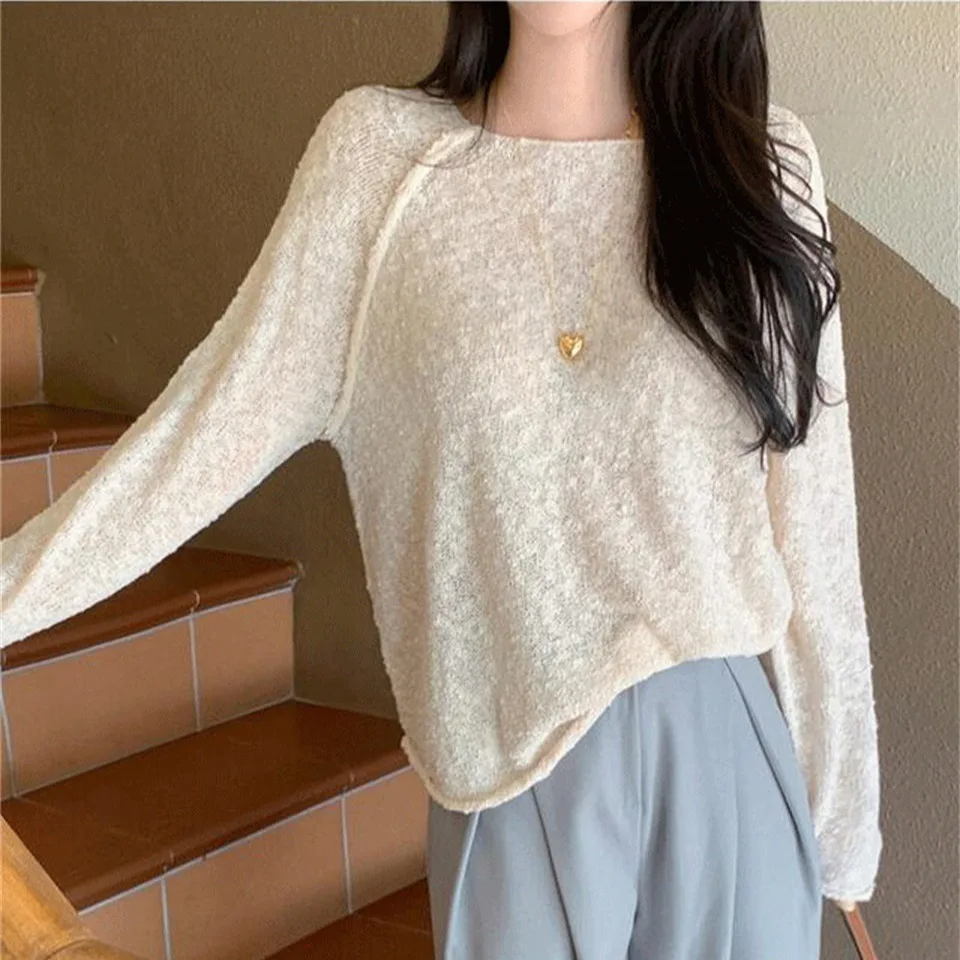 Loose Korean Japanese Style Pure Color Mid-Length Knitwear Thin Hollow out Ice Silk round Neck Sweater Casual Style Women's Top
Loose Korean Japanese Style Pure Color Mid-Length Knitwear Thin Hollow out Ice Silk round Neck Sweater Casual Style Women's Top