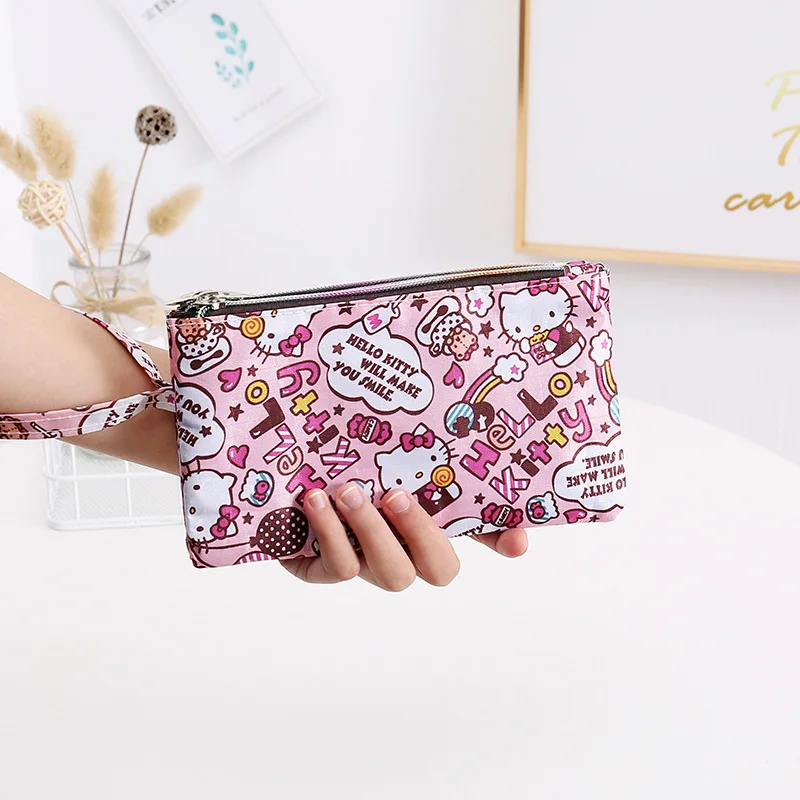 Sanrio Coin Purse Hello Kitty Cinnamoroll My Melody Kuromi Waterproof Double Zipper Bag Casual Mobile Phone Bag Girls Wallet
Sanrio Coin Purse Hello Kitty Cinnamoroll My Melody Kuromi Waterproof Double Zipper Bag Casual Mobile Phone Bag Girls Wallet