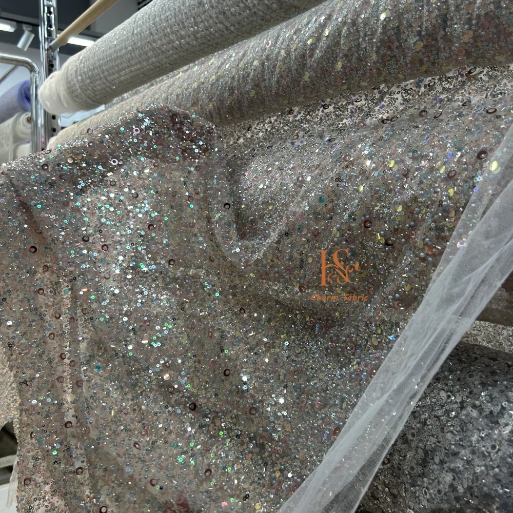 Высококачественная ткань с вышивкой жемчужной трубкой и блестками, высококачественная одежда своими руками на заказ, свадебные платья и вечерние платья
Высококачественная ткань с вышивкой жемчужной трубкой и блестками, высококачественная одежда своими руками на заказ, свадебные платья и вечерние платья