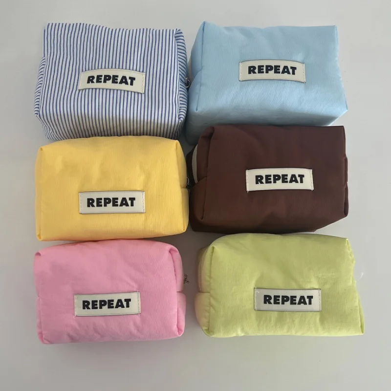 Korean Ins Candy Colored Block Nylon Makeup Bag Thickened Cotton Travel Wash Bag Waterproof Sanitary Pad Storage Bag
Korean Ins Candy Colored Block Nylon Makeup Bag Thickened Cotton Travel Wash Bag Waterproof Sanitary Pad Storage Bag