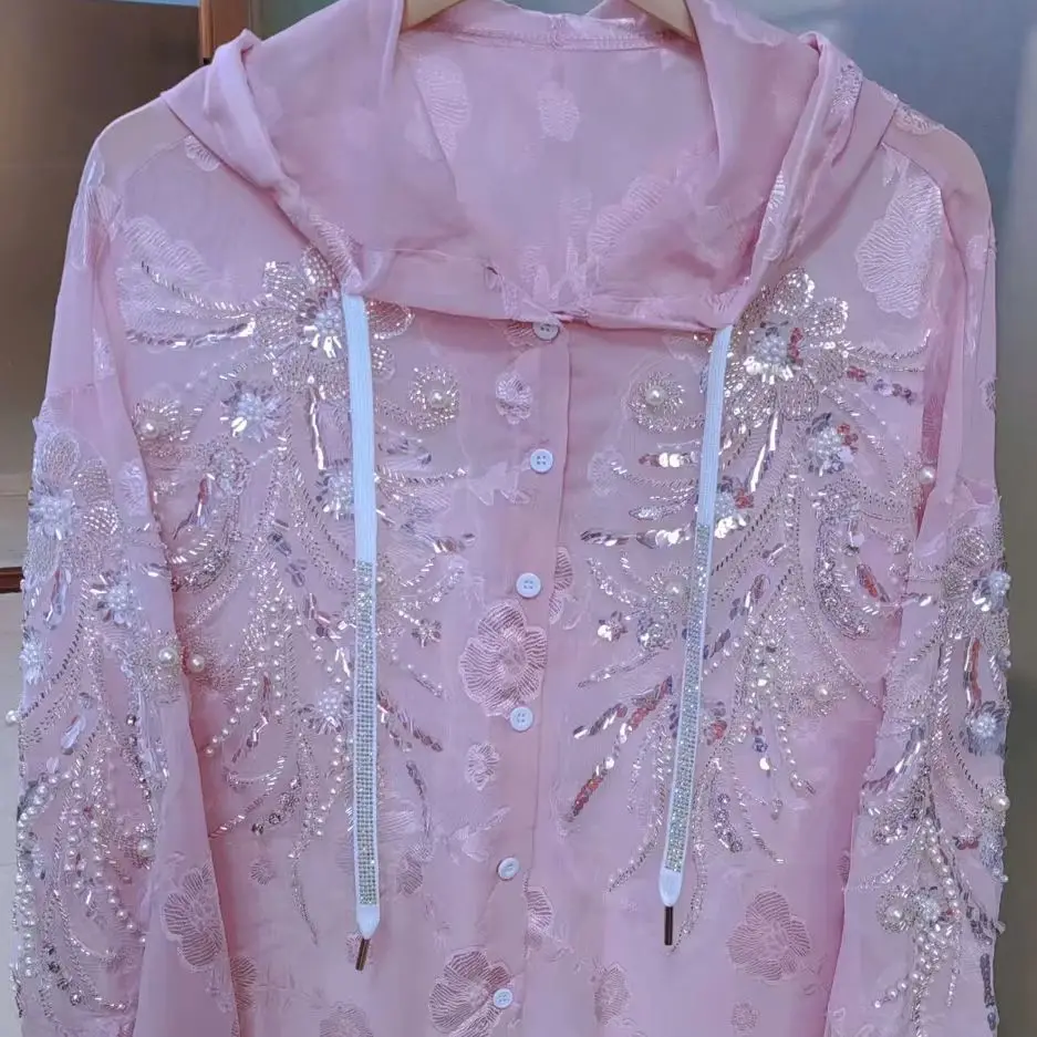 New 2025 Luxury Sparkle Pearls Sequins Stitch Oversize Buttons Up Hooded Sunscreen Shirts Blouses Women Pink Tops
New 2025 Luxury Sparkle Pearls Sequins Stitch Oversize Buttons Up Hooded Sunscreen Shirts Blouses Women Pink Tops
