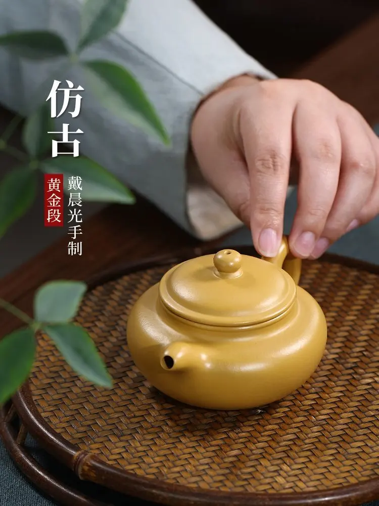 Yi Фиолетовый глиняный горшок, чайный сервиз ручной работы для кунг-фу, одинарный необработанный золотой желтый грязевой горшок, небольшая емкость, бытовой антикварный
Yi Фиолетовый глиняный горшок, чайный сервиз ручной работы для кунг-фу, одинарный необработанный золотой желтый грязевой горшок, небольшая емкость, бытовой антикварный