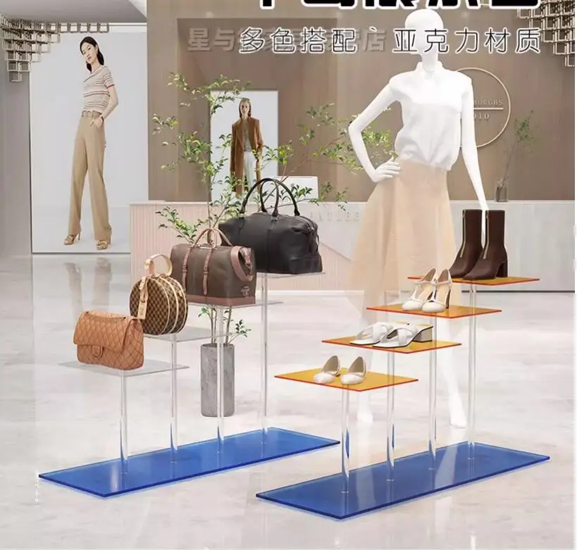 Clothing store acrylic transparent shoe bag placement props Women's clothing store flow table high and low display design
Clothing store acrylic transparent shoe bag placement props Women's clothing store flow table high and low display design
