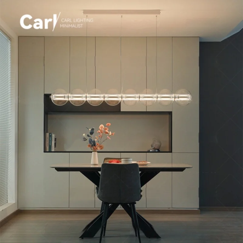Modern Glass Chandelier Designed By Nordic Designers for Home Dining Tables Bar Counters Restaurants One Line Long Chandelier
Modern Glass Chandelier Designed By Nordic Designers for Home Dining Tables Bar Counters Restaurants One Line Long Chandelier