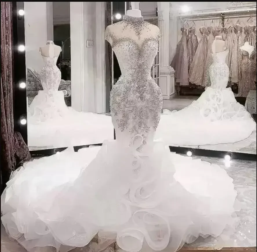Customized Luxury Heavy Beaded Crystals High Neck Mermaid Wedding Dresses Sweep Train Vestidos De Noiva Tiered Ruffles Bridal Go
Customized Luxury Heavy Beaded Crystals High Neck Mermaid Wedding Dresses Sweep Train Vestidos De Noiva Tiered Ruffles Bridal Go