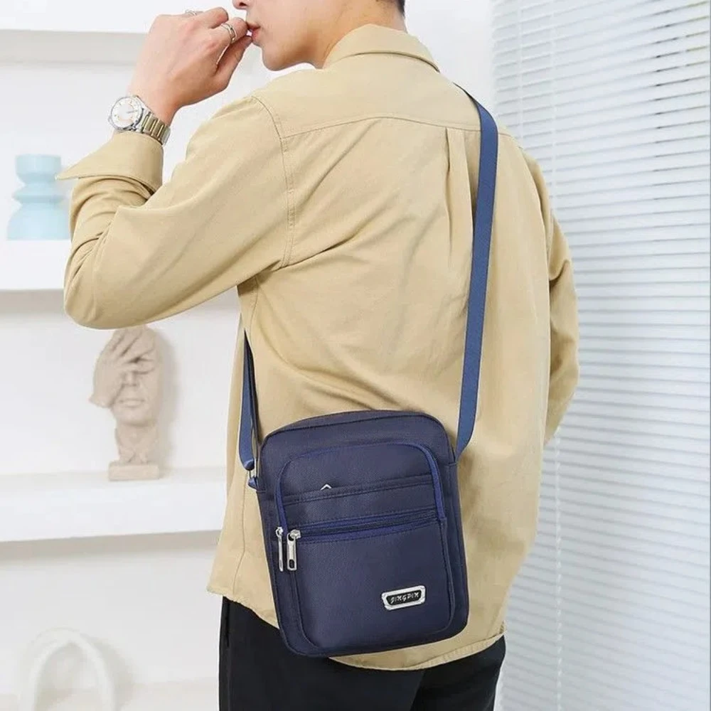 Fashion Letter Oxford Shoulder Bag Multi-Layer Large Capacity Men Messenger Bag Pack Waterproof Retro Square Bag Streetwear
Fashion Letter Oxford Shoulder Bag Multi-Layer Large Capacity Men Messenger Bag Pack Waterproof Retro Square Bag Streetwear