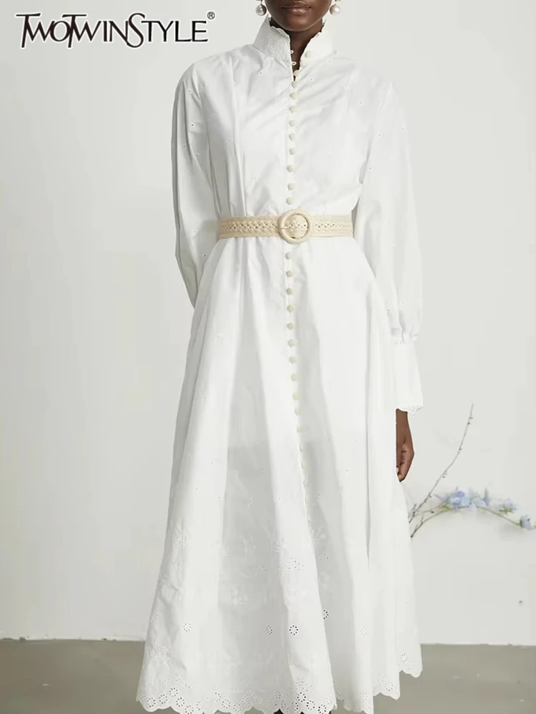 TWOTWINSTYLE Solid Loose Spliced Belt Dresses for Women Stand Neck Long Sleeves Patchwork Single Breasted Dress Female Clothing
TWOTWINSTYLE Solid Loose Spliced Belt Dresses for Women Stand Neck Long Sleeves Patchwork Single Breasted Dress Female Clothing