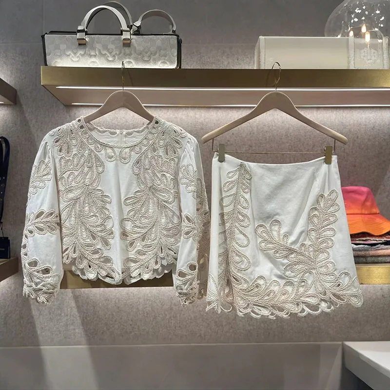 Women's new summer two-piece suit hollow embroidered round neck cardigan or slim skirt
Women's new summer two-piece suit hollow embroidered round neck cardigan or slim skirt