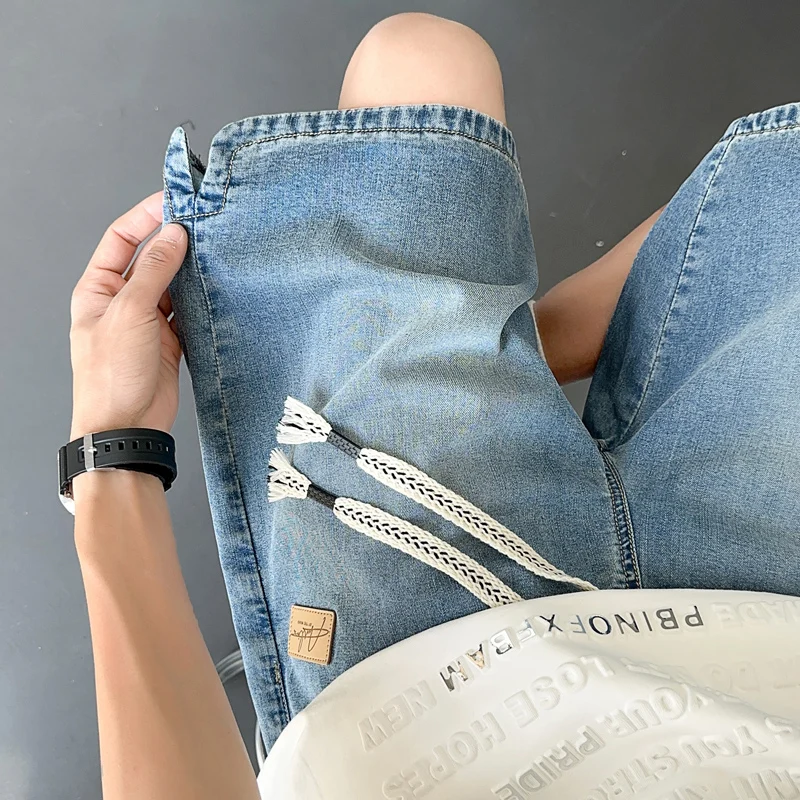 Summer Ice Silk Denim Shorts for Men Loose Breathable Straight Leg Knee Length Jeans Trendy Versatile Casual Washed Mid Pants
Summer Ice Silk Denim Shorts for Men Loose Breathable Straight Leg Knee Length Jeans Trendy Versatile Casual Washed Mid Pants