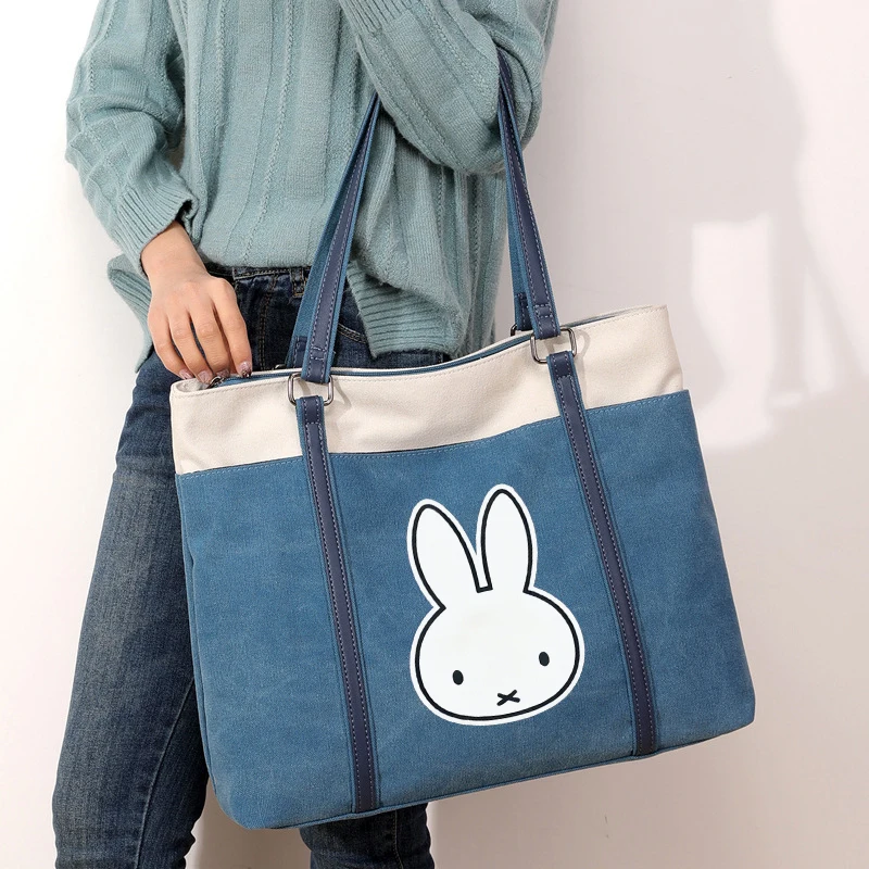 Новая сумка Kawaii Miffy на одно плечо, повседневная женская модная тканевая однотонная женская сумка, универсальная холщовая женская сумка
Новая сумка Kawaii Miffy на одно плечо, повседневная женская модная тканевая однотонная женская сумка, универсальная холщовая женская сумка
