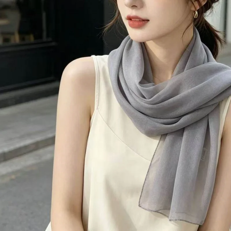 Summer High-End Solid Color Qiaoqi Silk Scarf Gray Spring Autumn Decoration Long Hanging Feeling Sun Protection Scarf Summer
Summer High-End Solid Color Qiaoqi Silk Scarf Gray Spring Autumn Decoration Long Hanging Feeling Sun Protection Scarf Summer