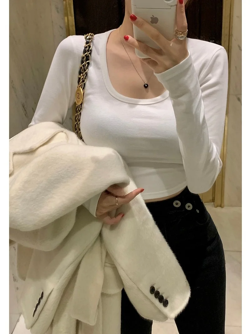 Белая базовая футболка U-Ne Brued oulder, женская осенне-зимняя утягивающая цветная футболка с базовым слоем, корейская внутренняя одежда
Белая базовая футболка U-Ne Brued oulder, женская осенне-зимняя утягивающая цветная футболка с базовым слоем, корейская внутренняя одежда