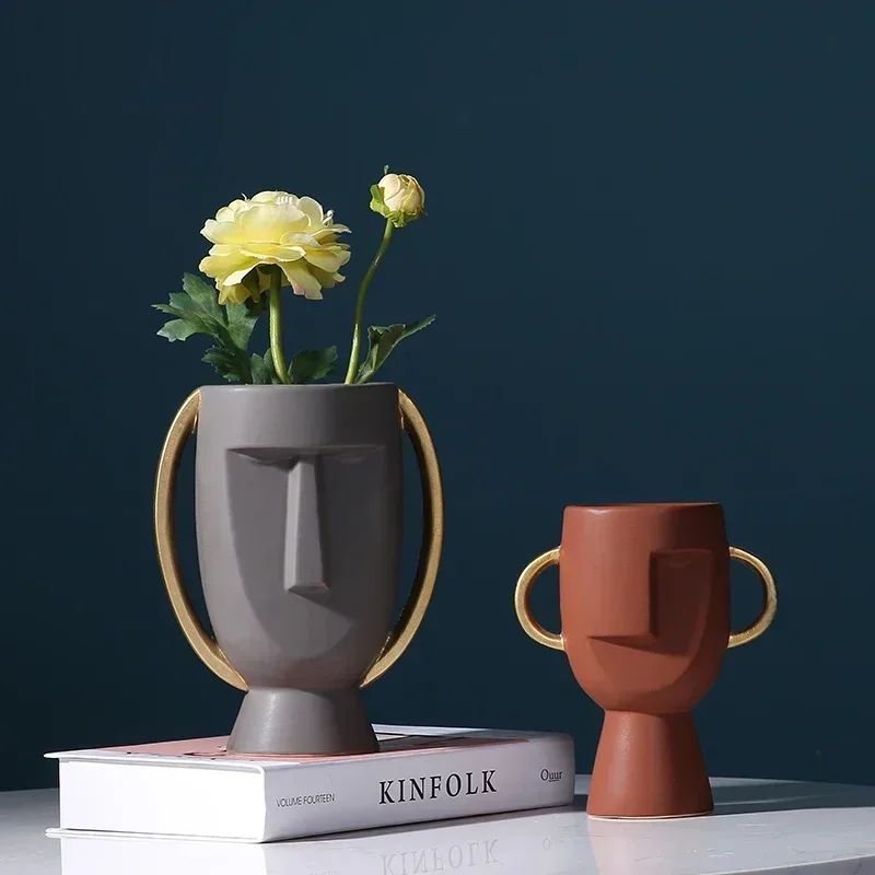Modern creative ceramic vase Ornaments abstract art head Figurine Ornaments interior living room TV cabinet home luxury decor
Modern creative ceramic vase Ornaments abstract art head Figurine Ornaments interior living room TV cabinet home luxury decor