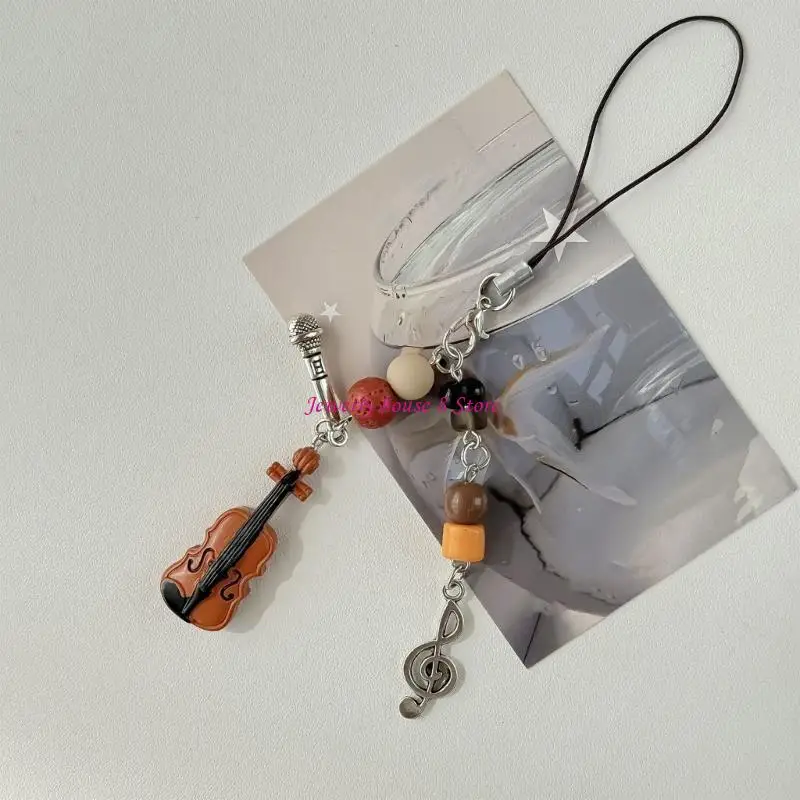 Handmade Violin Phone Charm Colorful Beaded Guitar Keyring Pendant Alloy Keychain Suitable for Decorating Accessories
Handmade Violin Phone Charm Colorful Beaded Guitar Keyring Pendant Alloy Keychain Suitable for Decorating Accessories