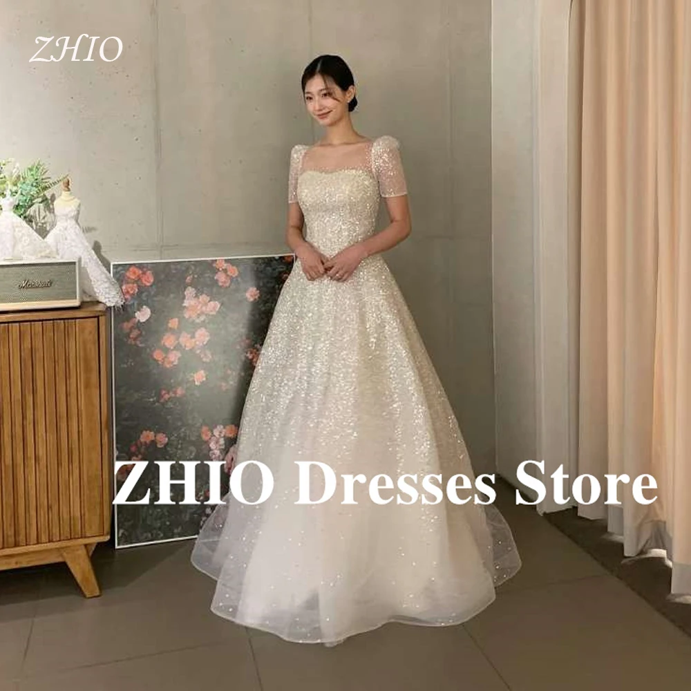 ZHIO Sparkly Glitter Wedding Dresses Korea Photo shoot Short Sleeves Square Neck Tulle Bride Gowns Shiny Evening Customized
ZHIO Sparkly Glitter Wedding Dresses Korea Photo shoot Short Sleeves Square Neck Tulle Bride Gowns Shiny Evening Customized