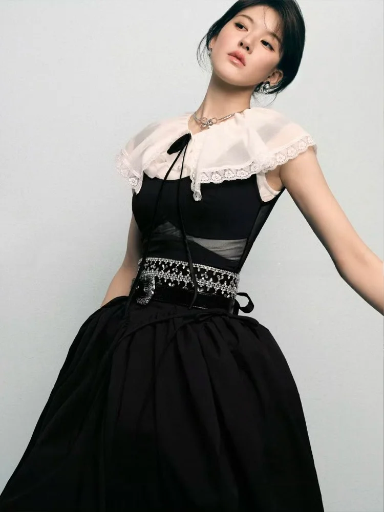 Летний женский комплект JONIByBEB: черная структурная блузка с воротником-стойкой и юбка из полиэстера
Летний женский комплект JONIByBEB: черная структурная блузка с воротником-стойкой и юбка из полиэстера