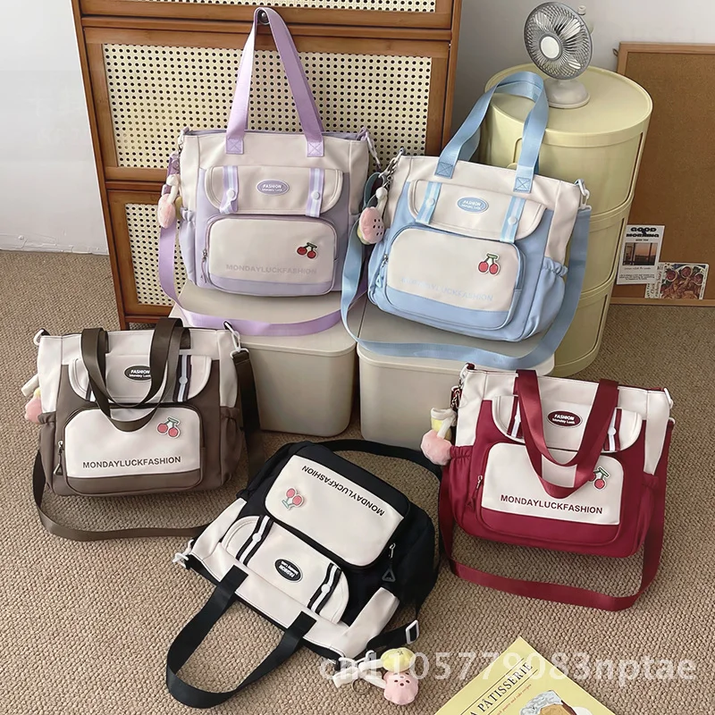 Sense Girl Student Handbag Large Capacity Nylon Crossbody Bag for High School College Tutoring Fresh Sweet Style Vertical Square
Sense Girl Student Handbag Large Capacity Nylon Crossbody Bag for High School College Tutoring Fresh Sweet Style Vertical Square