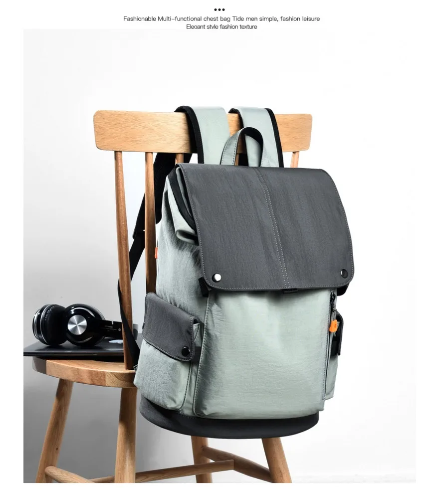 gray casual backpack roll top closure with orange zipper pulls side hidden pockets smooth waterproof fabric multi compartments
gray casual backpack roll top closure with orange zipper pulls side hidden pockets smooth waterproof fabric multi compartments