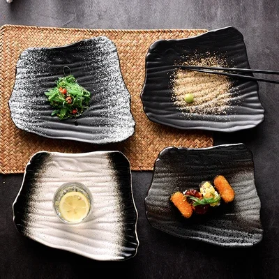 Creative ceramic sushi plate, Japanese style irregular flat plate, black breakfast plate, household dish plate, dessert
Creative ceramic sushi plate, Japanese style irregular flat plate, black breakfast plate, household dish plate, dessert