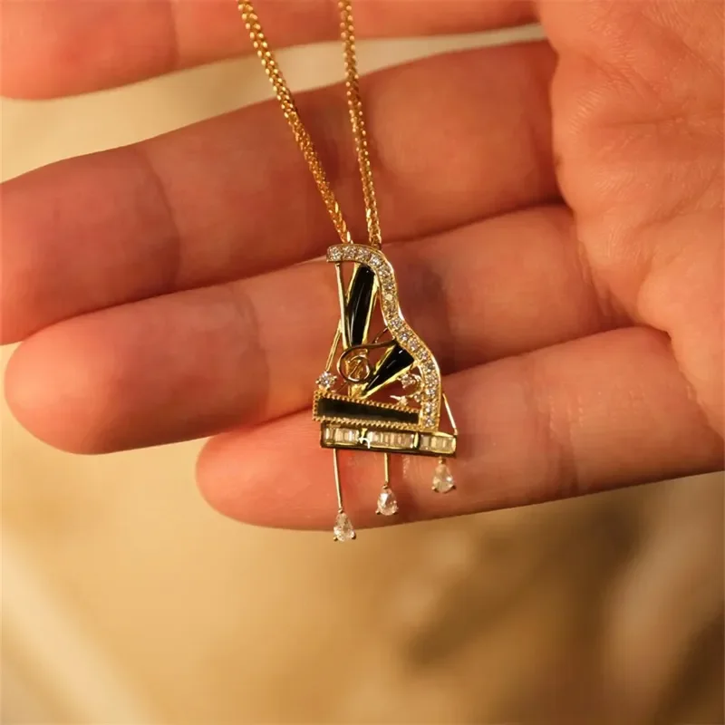 Art Style Black Drip Glue Inlaid Zircon Piano Pendant Necklace Women's Elegant Temperament Jewelry High-end Banquet Necklace
Art Style Black Drip Glue Inlaid Zircon Piano Pendant Necklace Women's Elegant Temperament Jewelry High-end Banquet Necklace