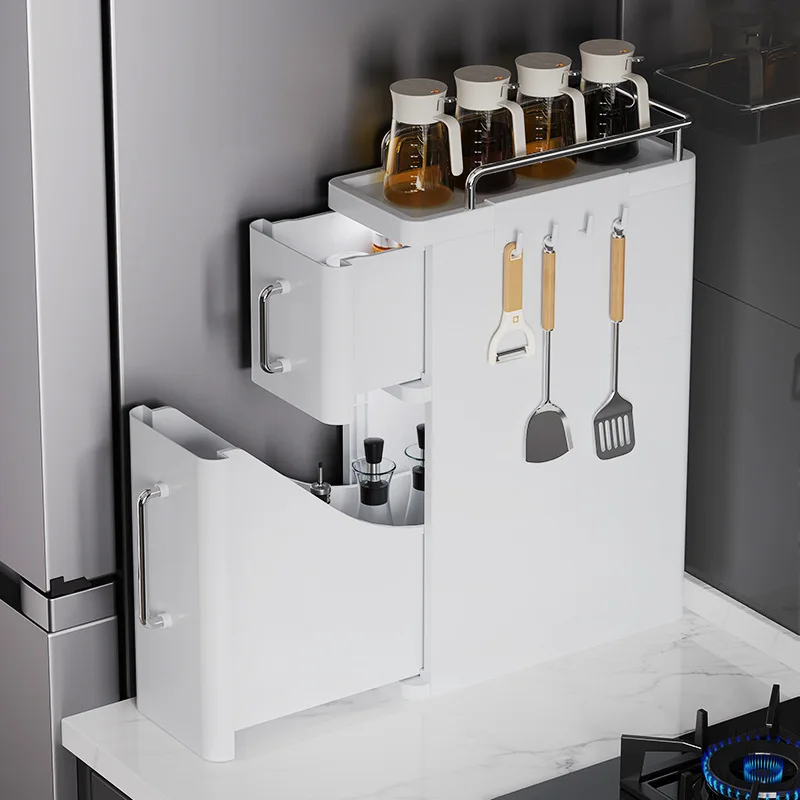 The new kitchen storage cabinet seasoning bottle can be hung on the side of the shelf with two layers of pulling seasoning racks
The new kitchen storage cabinet seasoning bottle can be hung on the side of the shelf with two layers of pulling seasoning racks