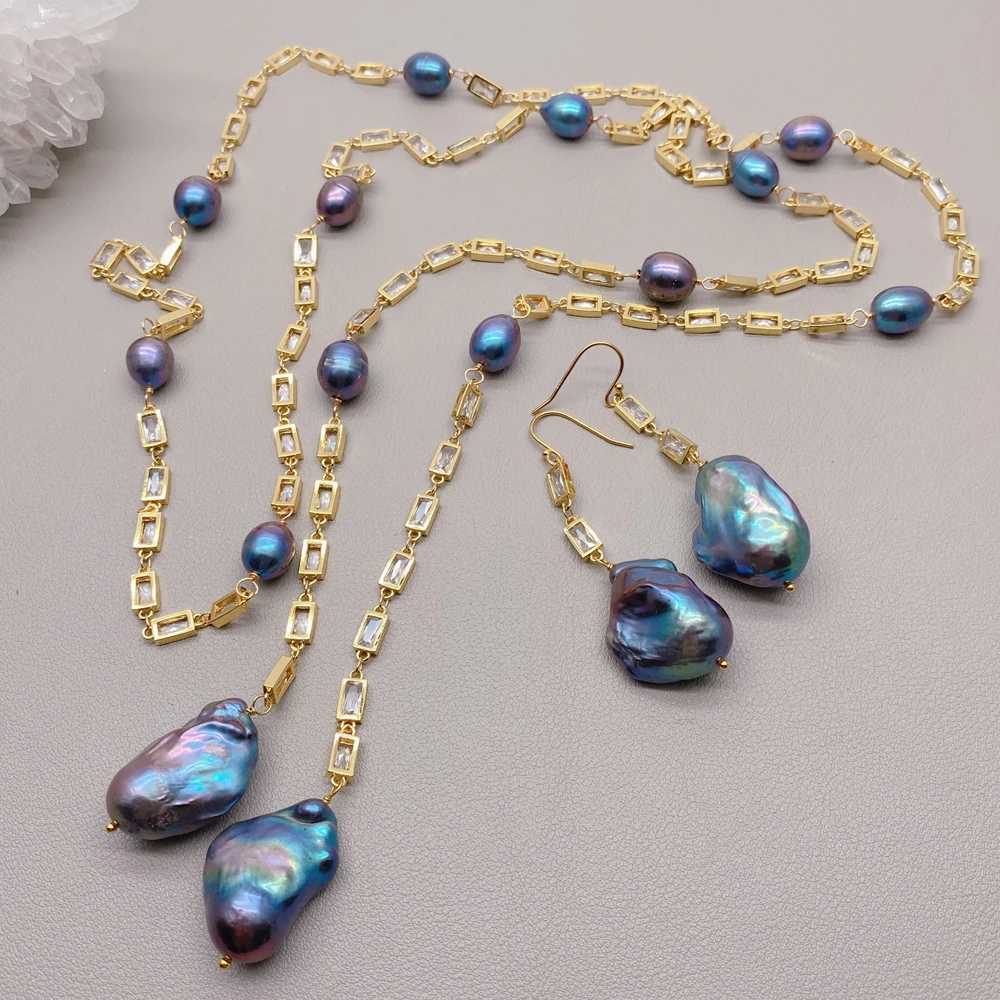 KKGEM CZ Pave позолоченная цепочка Черный рисовый жемчуг Натуральный фламинбол Жемчуг в стиле барокко Длинный лариат Ожерелье Серьги-крючки Женский комплект
KKGEM CZ Pave позолоченная цепочка Черный рисовый жемчуг Натуральный фламинбол Жемчуг в стиле барокко Длинный лариат Ожерелье Серьги-крючки Женский комплект