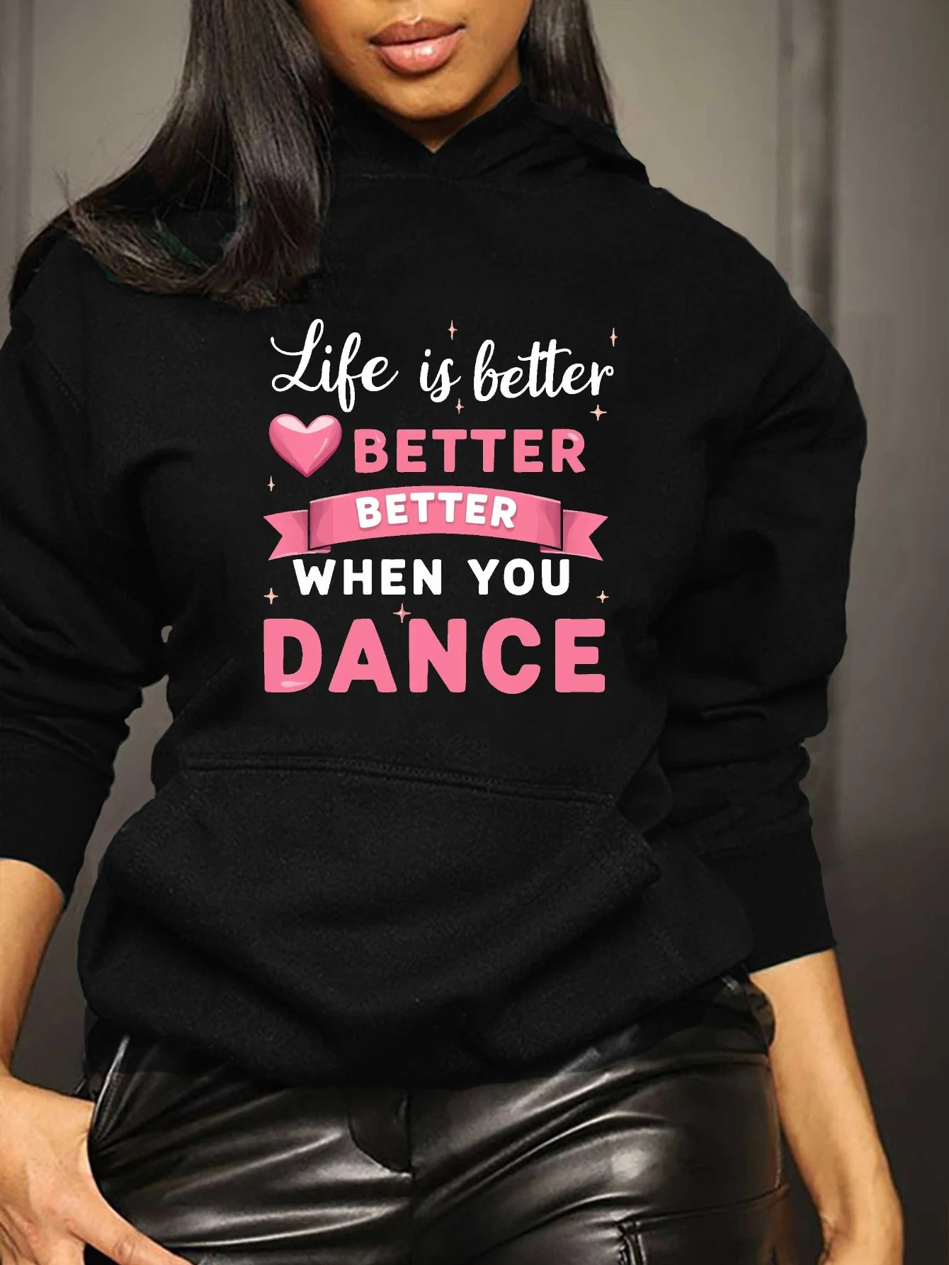Dancing Life Better Ladies Hoodie - Features pink letters and heart-shaped patterns, with a front pocket, casual pullover style
Dancing Life Better Ladies Hoodie - Features pink letters and heart-shaped patterns, with a front pocket, casual pullover style