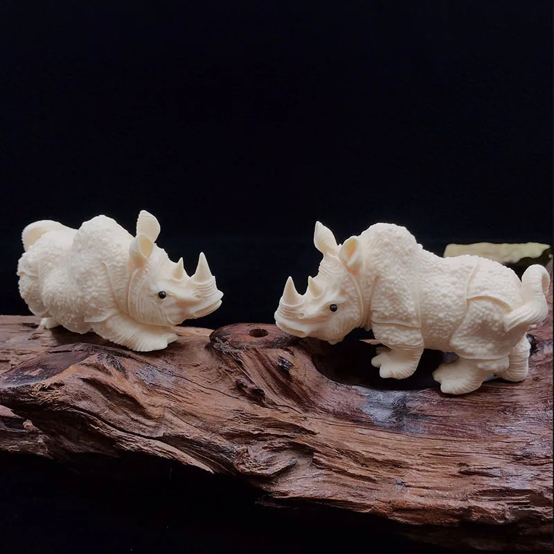 Ivory Nut Rhinoceros Ornaments Hand Pieces Playing Cartoon Ornament Carving Crafts Animal Craft Tea Ornaments Car Decorations
Ivory Nut Rhinoceros Ornaments Hand Pieces Playing Cartoon Ornament Carving Crafts Animal Craft Tea Ornaments Car Decorations