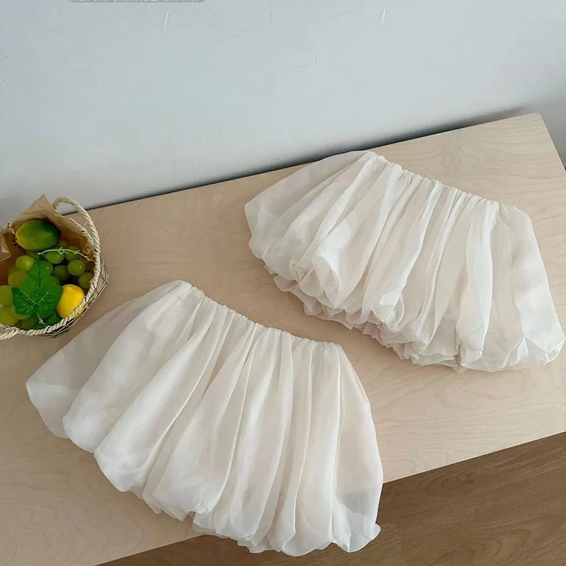 Women Summer White Bud Tulle Skirt Sweet Sexy Chiffon Mini Skirt Korean Cute Lolita Preppy Style Mesh Pleated Skirt
Women Summer White Bud Tulle Skirt Sweet Sexy Chiffon Mini Skirt Korean Cute Lolita Preppy Style Mesh Pleated Skirt